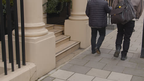 Close-Up-Of-People-Walking-Past-Buildings-In-Grosvenor-Street-Mayfair-London